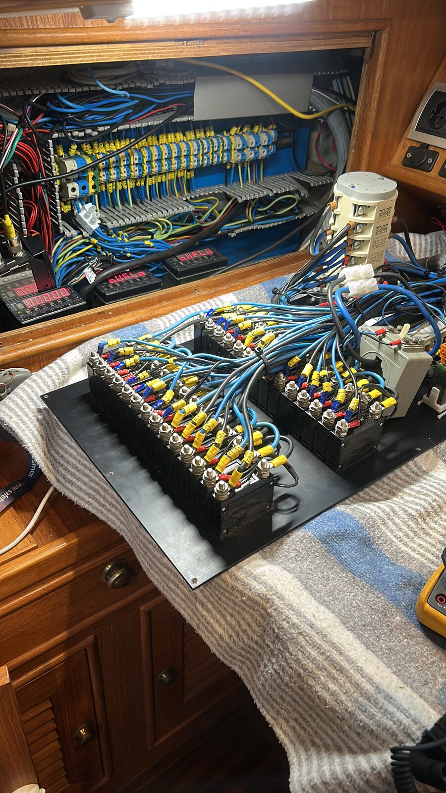 The AC panel being rewired by Marc as part of the inverter installation