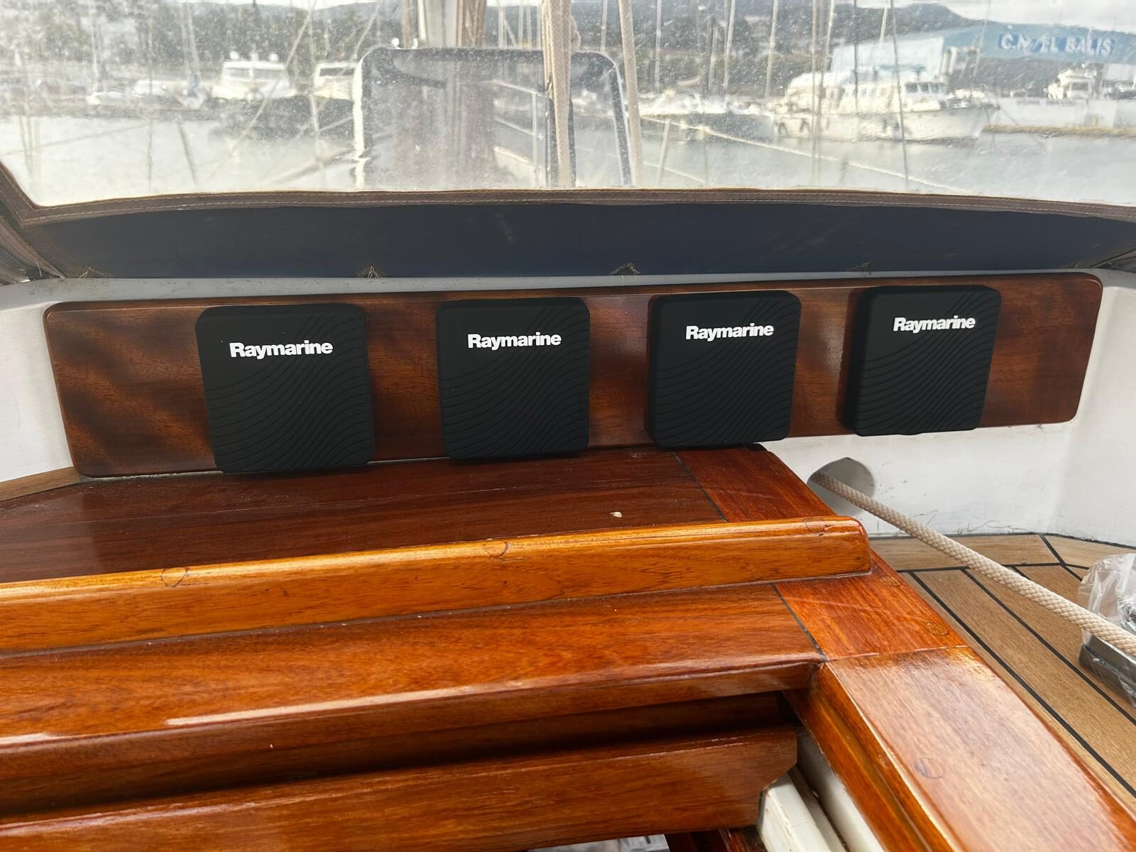 Protective covers fitted over the Raymarine instrument console aboard Gran Blau
